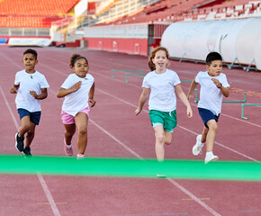 child sport athlete competition running race exercise sprinting speed runner achievement finish...