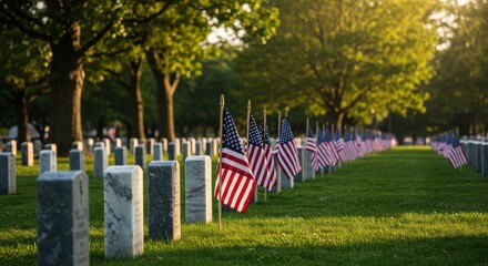 American flags adorn gravestones in a cemetery memorializing veterans on a sunny memorial day scene