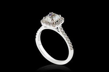 white metal ring, silver, gold with stone diamonds on black background