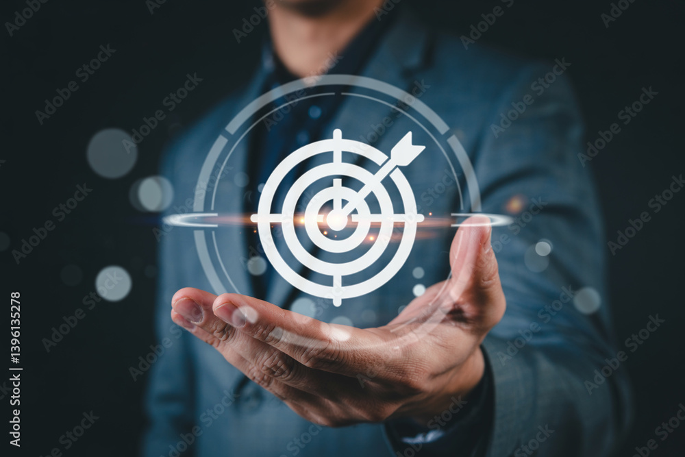 Poster A man holding a digital target with an arrow in his hand in a dark and blurry background scene