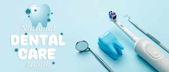 Electric toothbrush, tooth model and dental tools on blue background. World Dentist Day