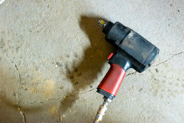 Close-up of Pneumatic Wrench in Auto Repair Shop