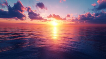 Obraz premium Vibrant sunset over the ocean with pink and purple clouds reflecting on the water surface beautifully