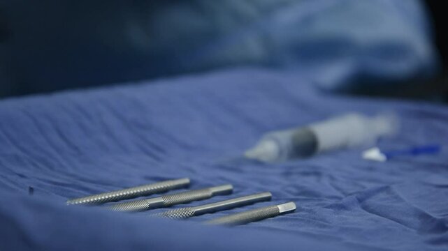 A smiling patient lies comfortably in an ophthalmic operating room, surrounded by caring professionals. The image captures the human side of healthcare and the journey toward clearer sight.

