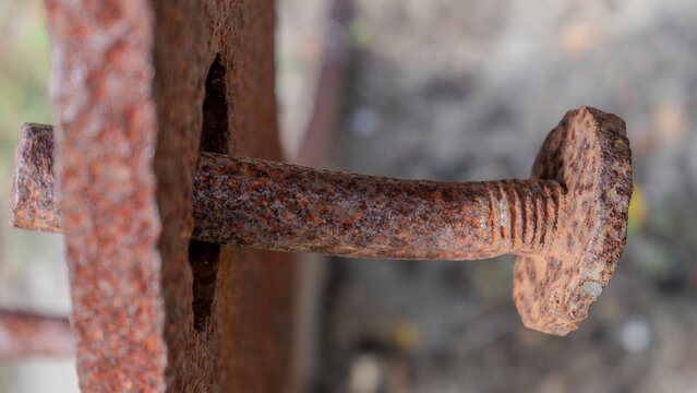 Rusted and pitted iron 19th Century fastener still retains some of its threading, found within Fort Gaines on Dauphin Island Alabama