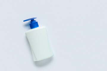 Bottle of sanitizer on white background