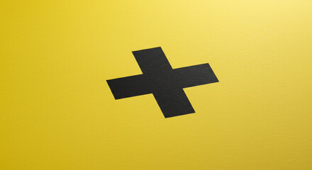 Obraz premium A bold black cross against a vibrant yellow background, symbolizing hope, positivity, and new beginnings with a minimalist design.