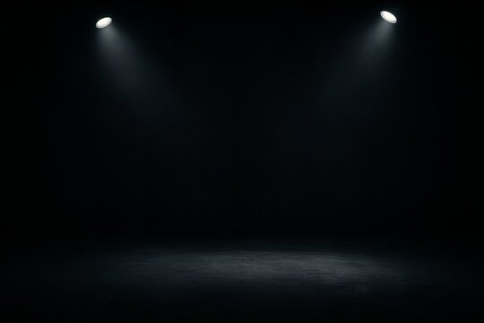Sala preta vazia com duas fontes de luz vinda de cima. Palco escuro com iluminação dramática, perfeito para apresentações ou performances

