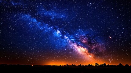 Fototapeta premium Night sky filled with Milky Way and stars