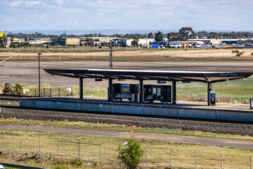 Train platform at Williams Landing Station, Melbourne, Australia featuring a covered waiting area...