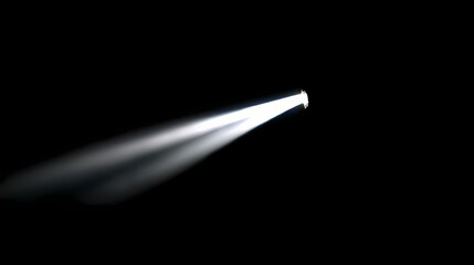 Beam of Light: An abstract image featuring a concentrated beam of bright white light against a stark black background, creating contrast.