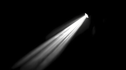 A beam of light pierces the darkness, illuminating the surrounding space. The contrasting shades create a dramatic, eye-catching display.