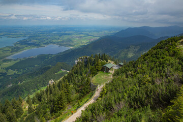 Fototapeta premium Rustic Wooden Mountain Retreat Overlooking Pristine Alpine Valley, Schwangau area, gERMANY