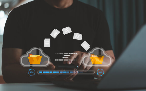 Businessman use computer with cloud service management digital file storage transfer. document sharing file access, backup sync data, online documentation database technology. Data Transfer concept.