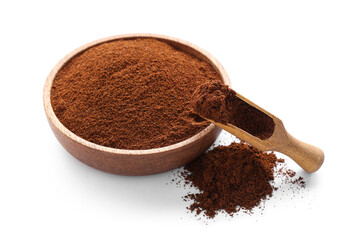 Bowl and wooden scoop with coffee powder on white background