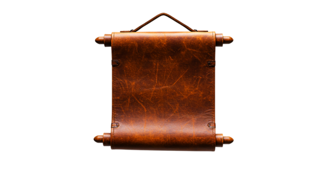 A close up shot of a brown leather scroll hanging against a black background in a studio setting