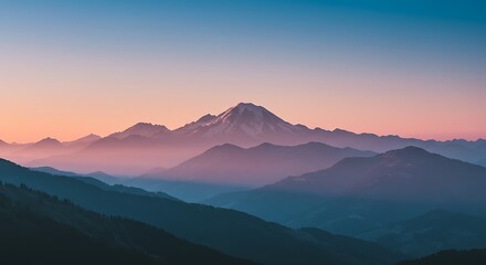 Obraz premium Mountain range silhouette at sunrise with gradient colors - tranquility and peace - travel photography or landscape blogs
