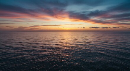 Obraz premium Ocean at sunset - tranquility and serenity - travel or environmental media.