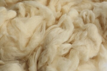 Soft white wool texture as background, closeup