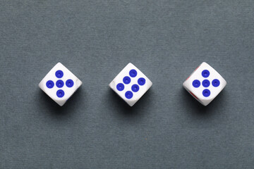 White game dices on grey background