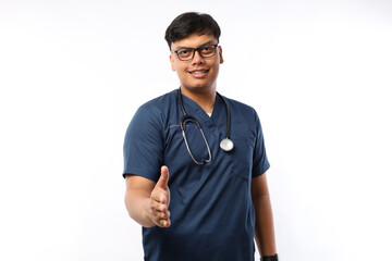 Fototapeta premium Male doctor extending hand for handshake on white background