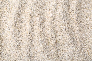 Superfood product. Oat powder as background, closeup