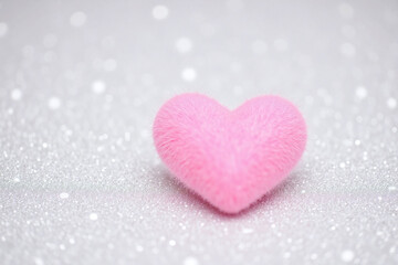 Fototapeta premium pink heart on a silver glitter background
