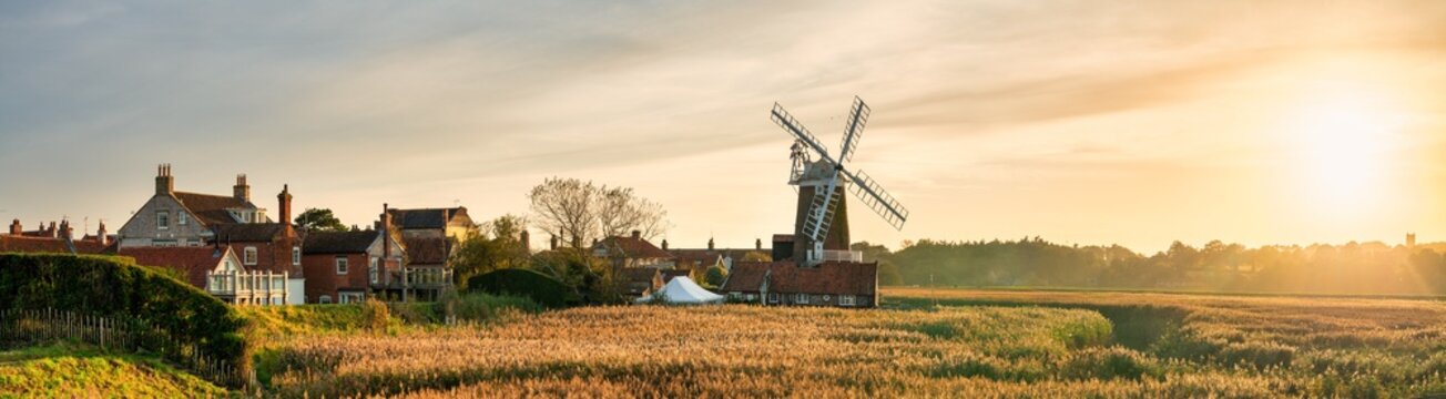 Cley Windmill at sunset in the village of Cley, Norfolk, UK