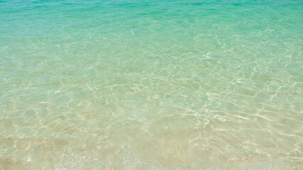 Tropical turquoise clear sea water ripple surface