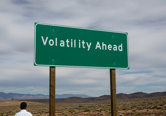 Symbolic Highway Sign Warning of Economic Volatility Ahead Amid Cloudy Financial Outlook