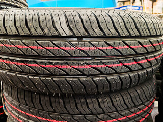 close up of tires stacked on top of each other