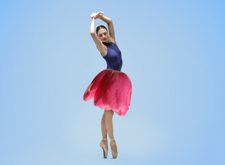 Young ballerina dancing on light blue background. Tulip flower instead of woman's skirt © New Africa
