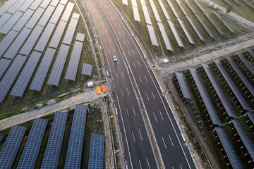 aerial view solar power station during sunset
