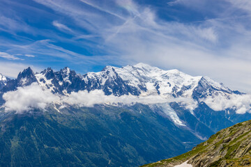 Obraz premium Mont Blanc, Monte Bianco mountain summit snow dome above the Chamonix valley in France. Highest peak in Europe in the Alps, alpine scenic view of Montblanc