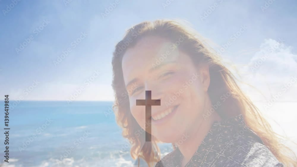 Poster at beach, person with cross symbol overlay on face, creating animation