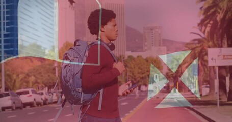 Holding phone, young man with backpack in urban street with animation overlay - Powered by Adobe
