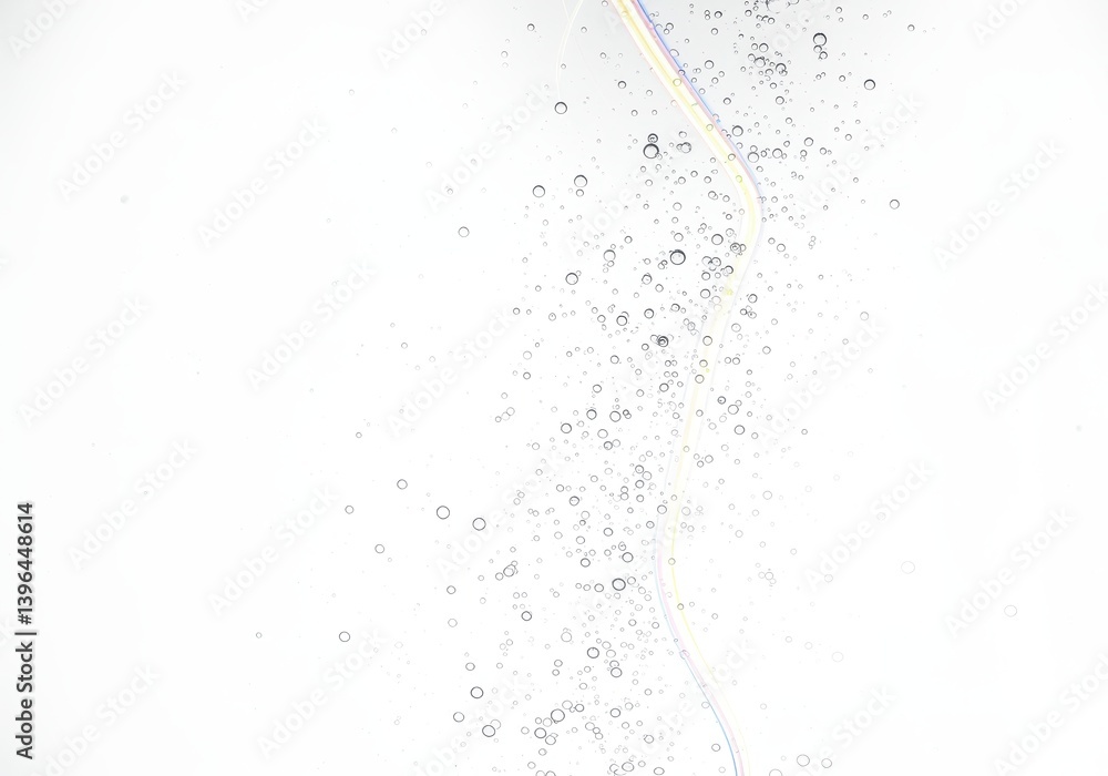 Aufkleber a stream of water bubbles rising against a white background with a translucent effect and light refr