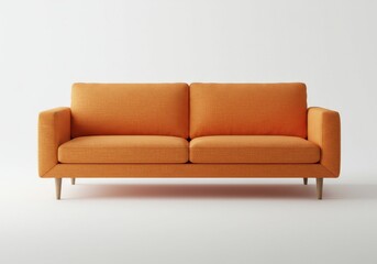Obraz premium A vibrant orange sofa with a minimalist design against a plain white backdrop in a studio setting