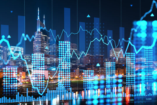 Cityscape of Nashville, Tennessee at night with holographic data and graphs overlay. Double exposure concept of business and technology. Double exposure