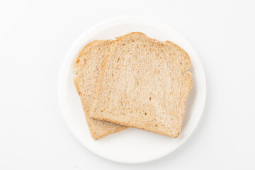A staple bread made by mixing yeast into flour, kneading it, and baking it.