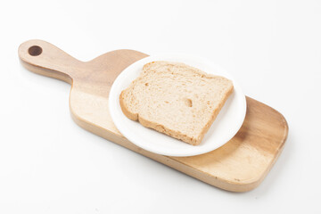 A staple bread made by mixing yeast into flour, kneading it, and baking it.