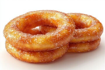 Fototapeta premium Three golden, sugar-coated rings of fried dough