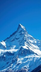 Majestic snow-capped peak piercing a flawlessly blue sky, phenomenal, remote, awe-inspiring