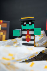 Fototapeta premium Bangkok, Thailand - April 10, 2025 : Toy of Zombie hamburglar form McDonald. Blind box toy from McDonald's collaboration with Minecraft movie.