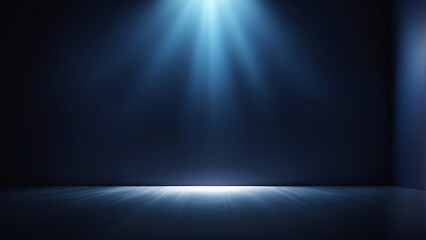Blue spotlight beam in dark empty room with misty light rays