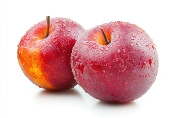 Fresh Plums with Water Droplets on White Background Close Up