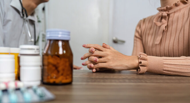Patient Dialogue and Medication Discussion. A patient discussing her health condition and medication options with a healthcare provider.