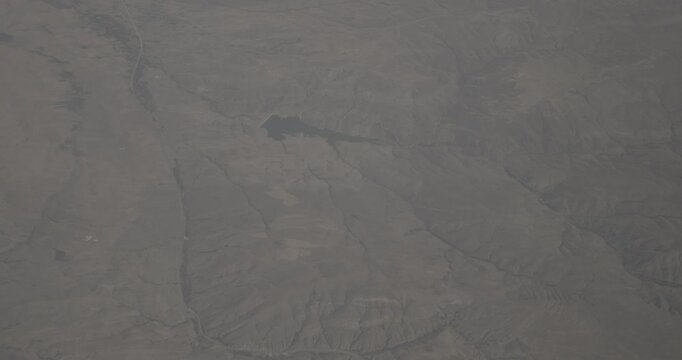 Flight above Aerial View Of Yap alt n Dam, Sarkisla town Cemel Baraji Cemel Dam. Sarkisla is a town in the Central Anatolian Sivas Province of Turkey. Video Taken From Plane Window. Travel And Tourism