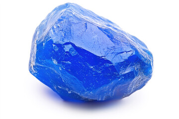 A vivid blue mineral rock with smooth surfaces and sharp edges, reflecting light and showcasing its striking color.