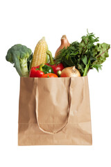 fresh vegetables in a paper bag on white background